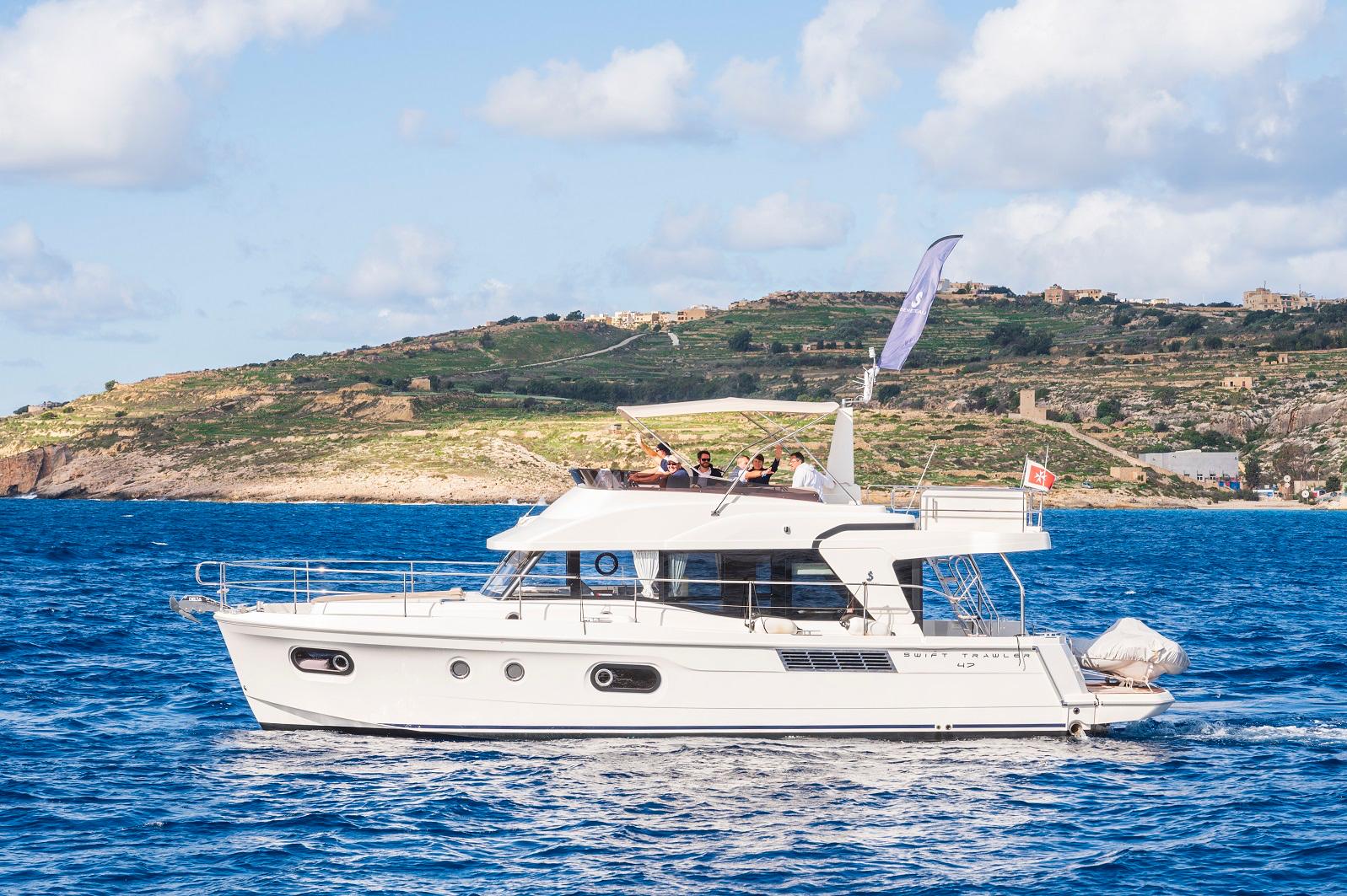 Limestone cliffs and coastline of Gozo seen from BANDAMA yacht
